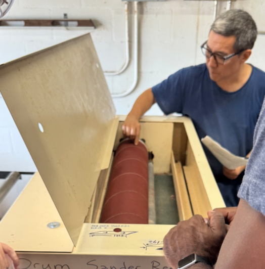 File:Inspecting the Sandpaper Roll.png